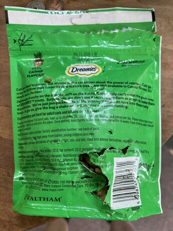 A savaged packet of Dreemies - left unattended for a few minutes