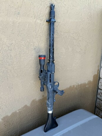 A slightly different angle of a modified (8 inches of barrel/shroud shorter) DLT-19X heavy blaster rifle, now weathered.