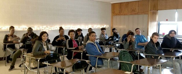 The hype and reality of personalized learning: a photograph of children sitting at desks in a classroom. Image attribution: edusurge