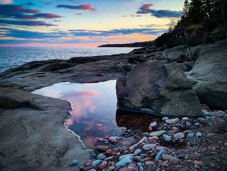 Small tidepool alongside ocean