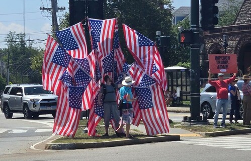 Protesting the regime with a lot of American flags