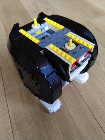A photo of the base of a Lego Tuxedo Cat. Work in progress