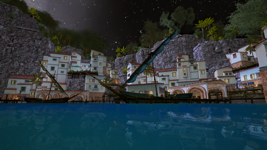 The dock of a town of white-walled buildings, with a few smallish ships moored there. The night sky is above it, cliffs around it and the shot is taken from in the blue ocean water, so that's the foreground.