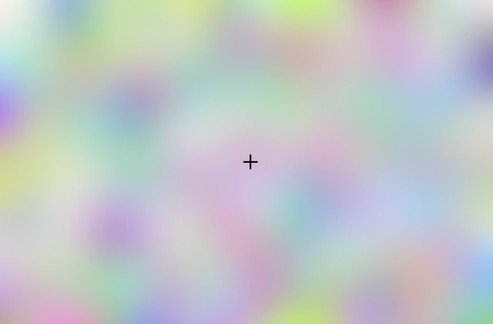 A small cross surrounded by bright colours
