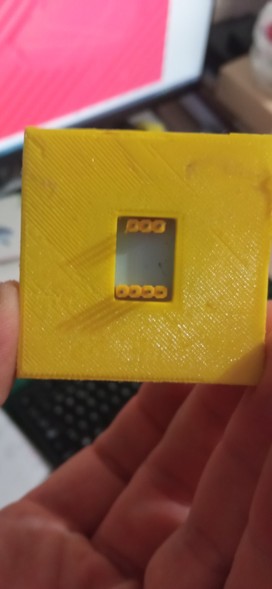 A 3D printed socket for an Arduino AS5600 position sensor module, rear view.