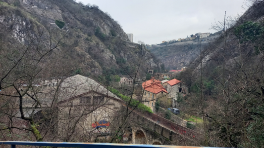 View of the (mostly) abandoned buildings and ravine from higher up.