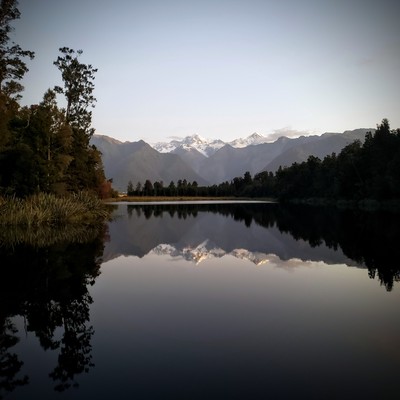 Southern alps reflecting in lake Matheson.
