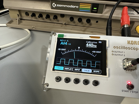KORG NTS-2 oscilloscope/tuner showing an A# note from a C64. 