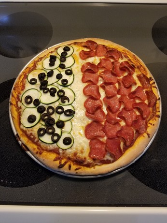 Zucchini and olives on one side, turkey pepperoni on the other.