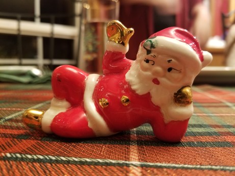 Reclining ceramic Santa