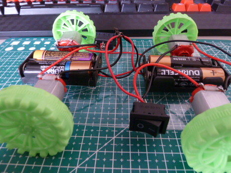 Photo of a 4-wheel drive motor driven car.  